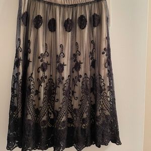 Beautiful black over beige  skirt for evenings and parties.